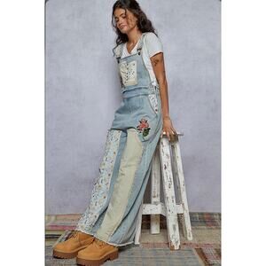 Patchwork oversized fit overall in twill with embroidery detail.